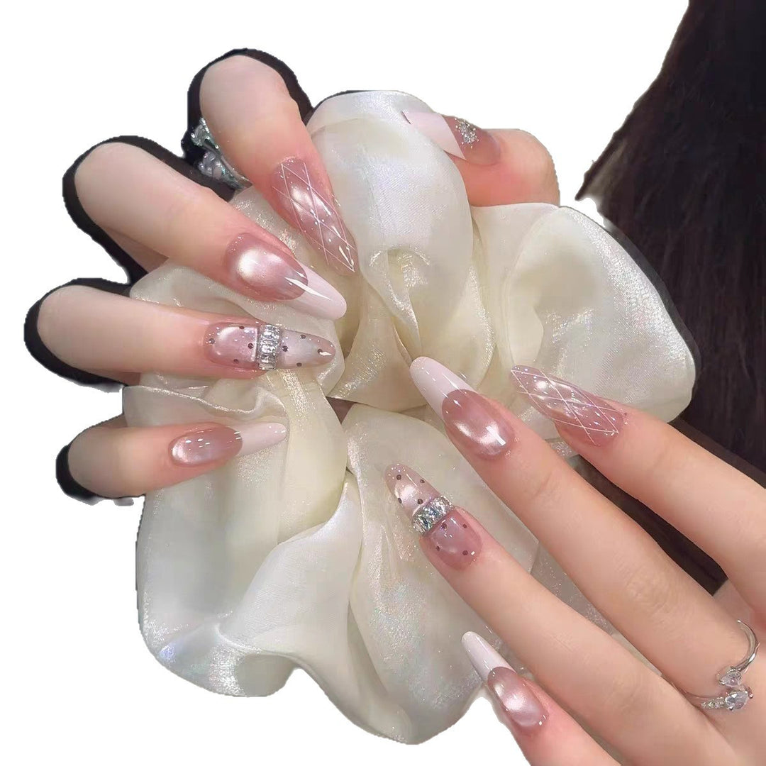 Elegant Stiletto Nail Art Extensions with Decorative Accents Stornfield