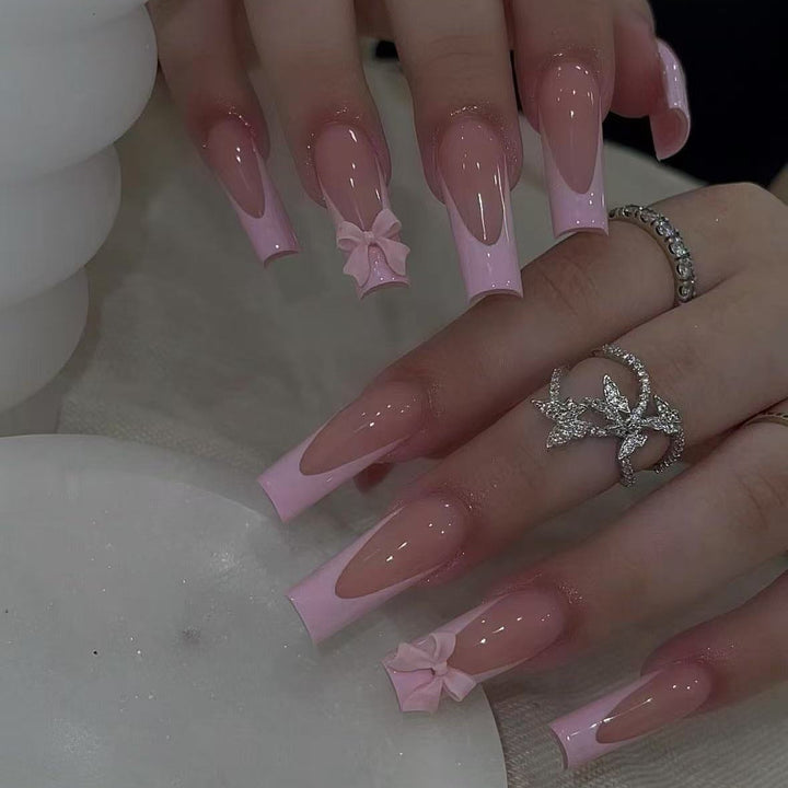 Artificial nail set with elegant tips and playful 3D design Stornfield