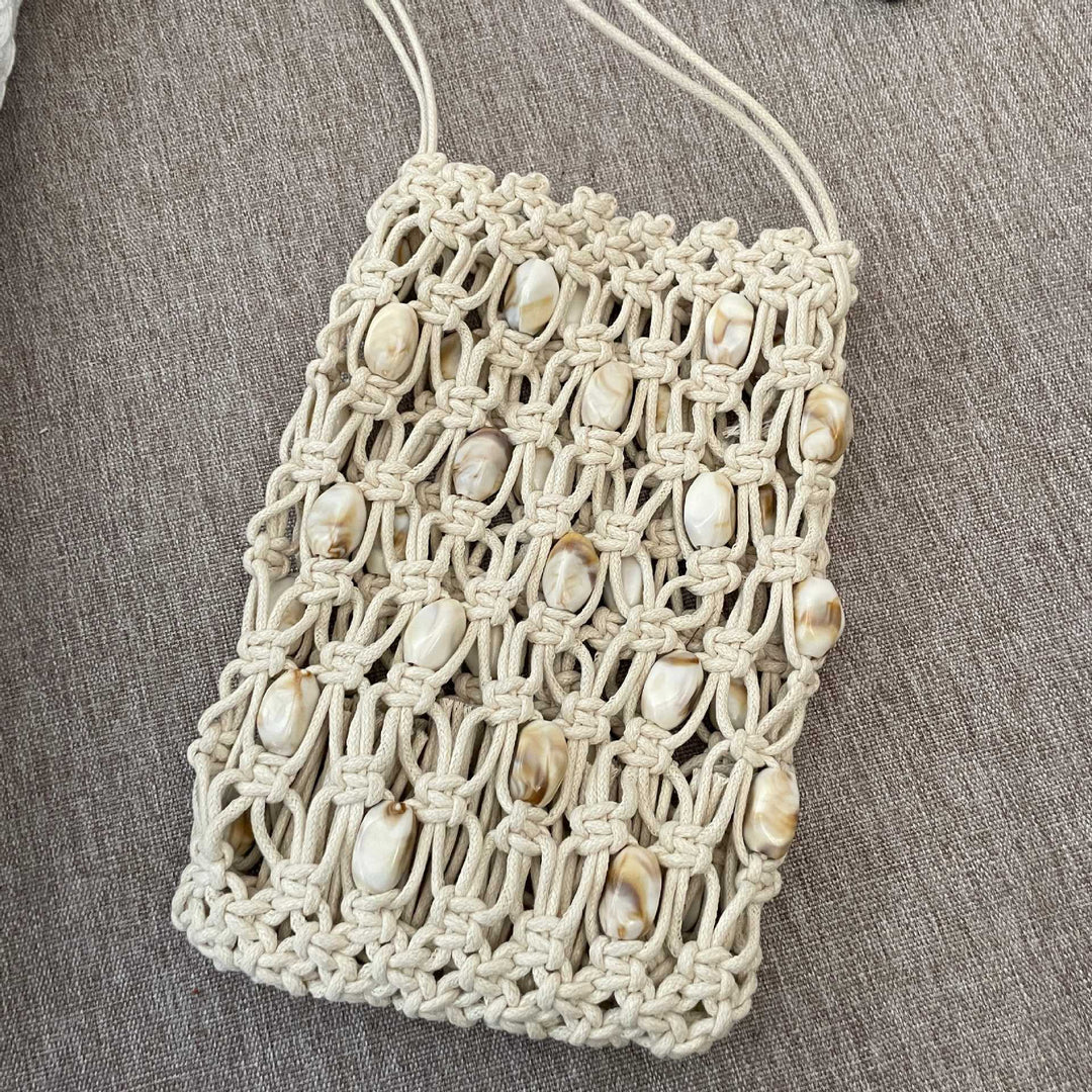 Hand-knotted shoulder bag with shells Stornfield