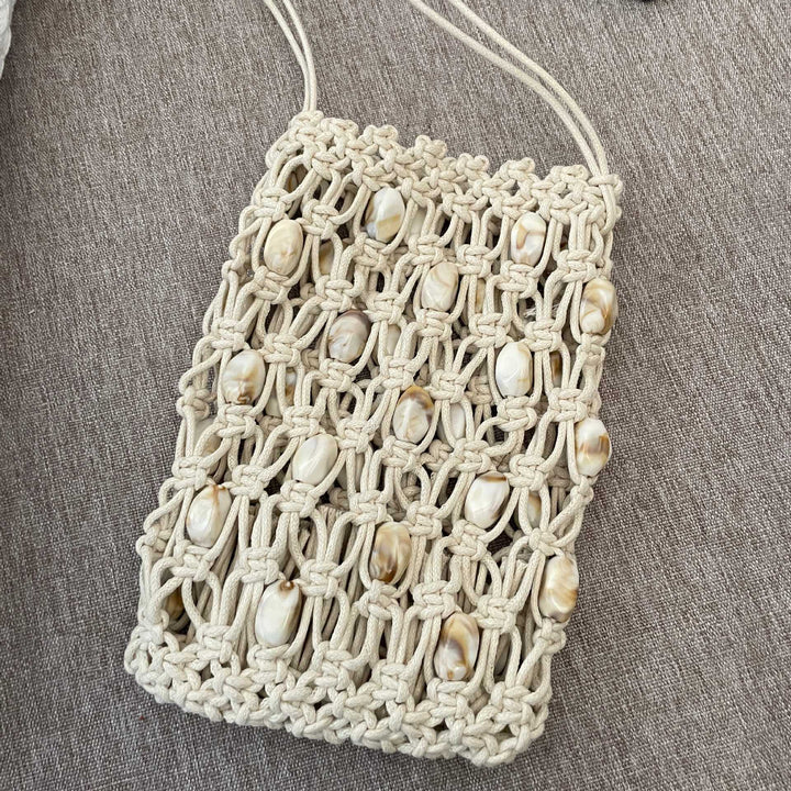 Hand-knotted shoulder bag with shells Stornfield