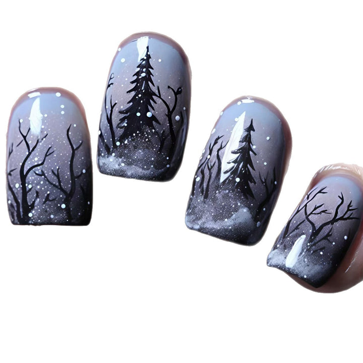 Artificial nail art with winter forest motif Stornfield