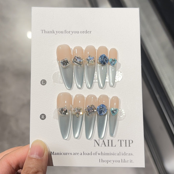 Glamorous artificial nails with sparkling stones Stornfield