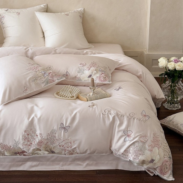 Luxurious cotton satin bedding set with floral embroidery and lace trim