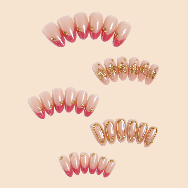Artful nail tips with delicate gold accents Stornfield
