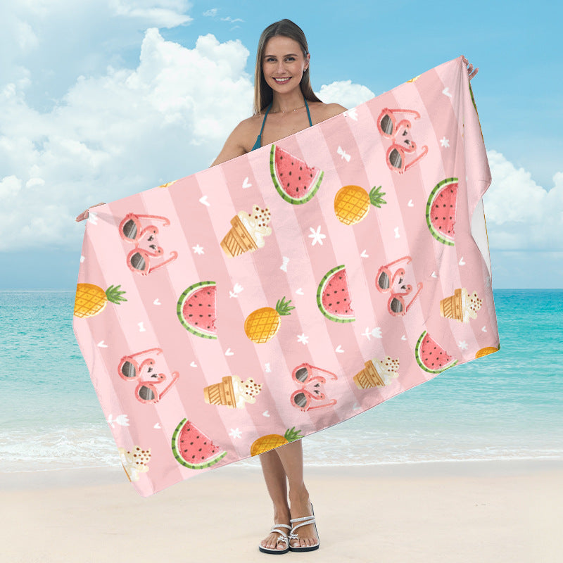Beach towel with tropical leaf design Stornfield