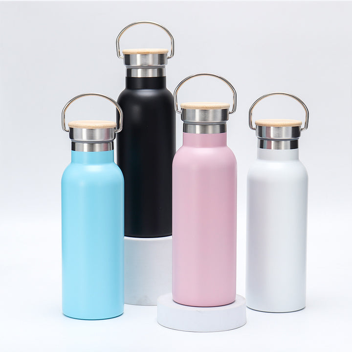 Women's insulated stainless steel drinking bottle with wooden lid Stornfield