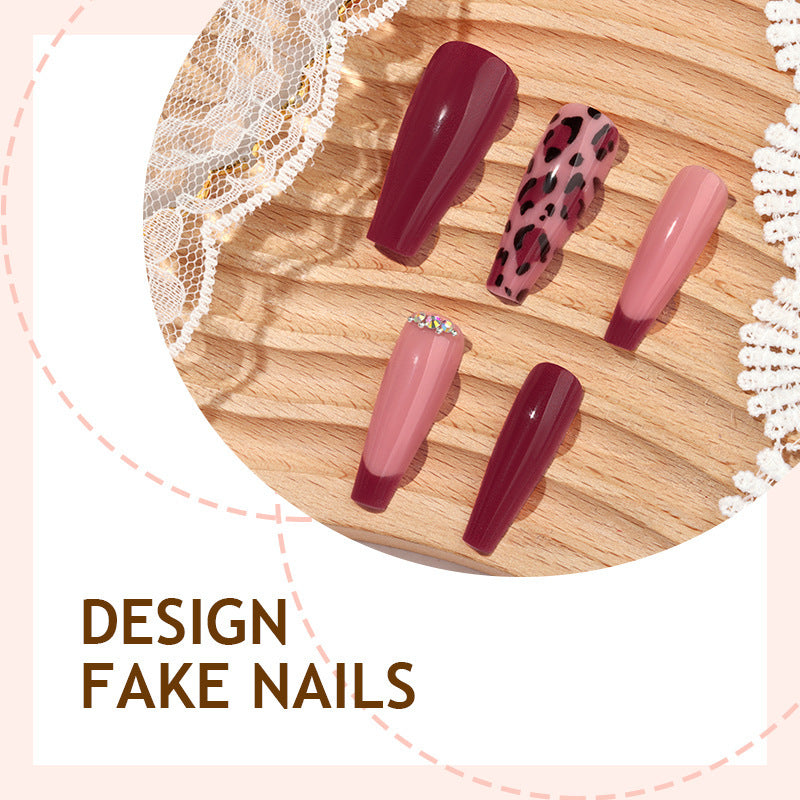 Artificial nail set with elegant animal print and glitter accents Stornfield