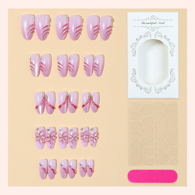 Acrylic nail set with elegant flower and glitter patterns Stornfield