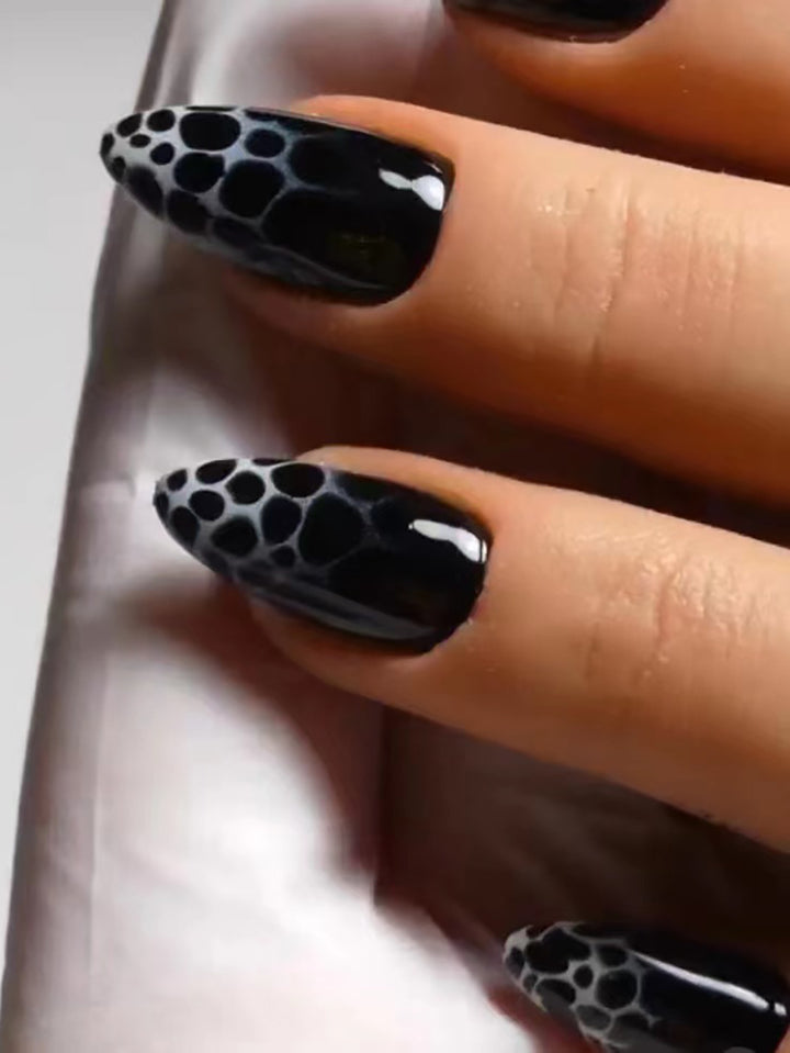 Stiletto Nail Art with Abstract Patterns Stornfield