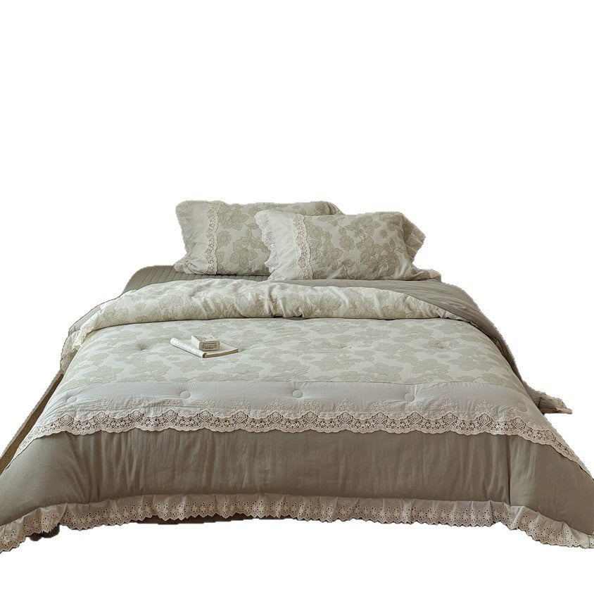 Vintage cotton bedding set with lace trim and hand-drawn floral pattern