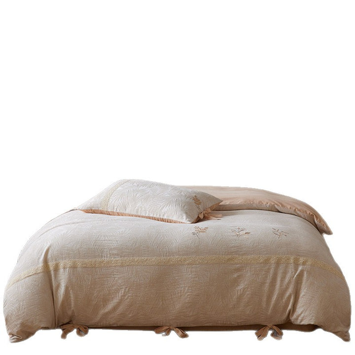 Premium cotton duvet cover with floral embroidery, lace trim and ribbon closure