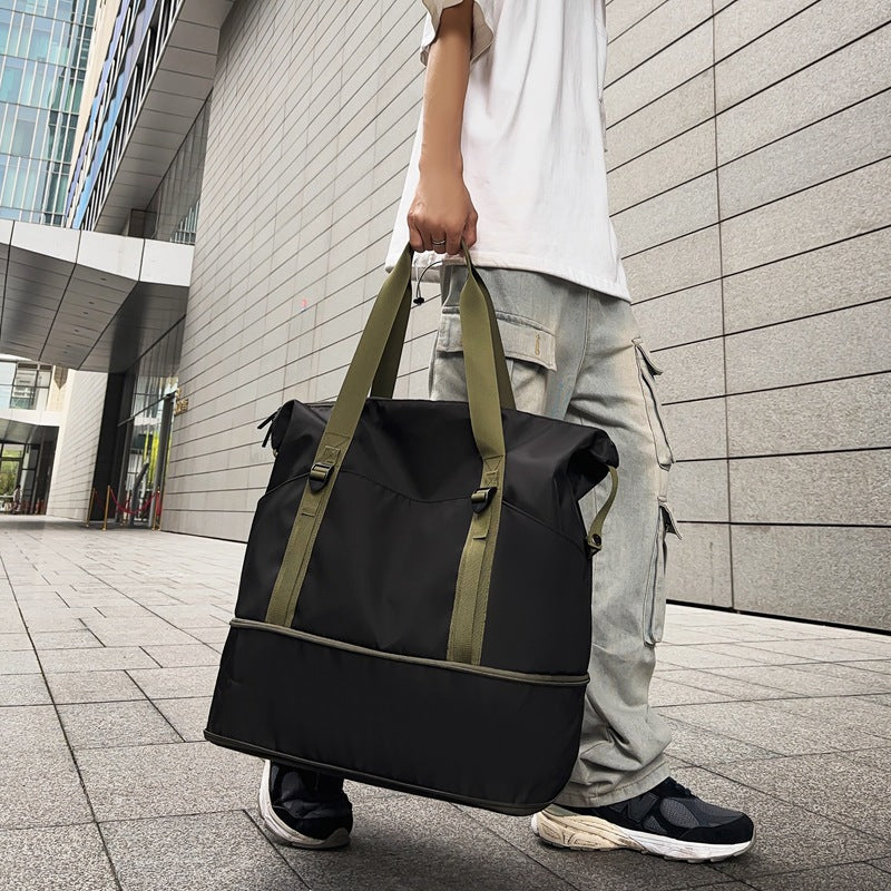 Sporty shoulder bag with water-repellent material and sturdy carrying handles Stornfield
