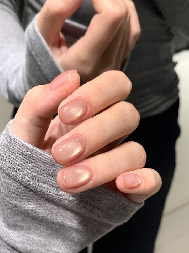 Shiny artificial nails with natural effect Stornfield