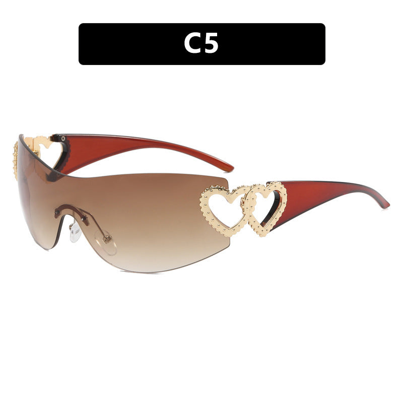 Ladies sporty sunglasses in trendy shield design with heart accents Stornfield
