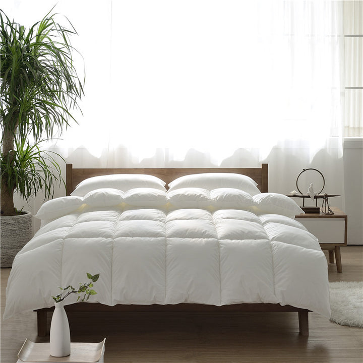 Lightweight all-season duvet with hypoallergenic hollow fiber filling and box chamber quilting