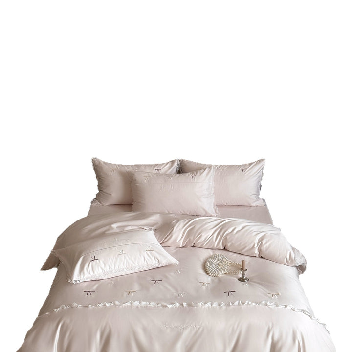 Bedding set made of cotton satin with embroidered bows and lace ruffle