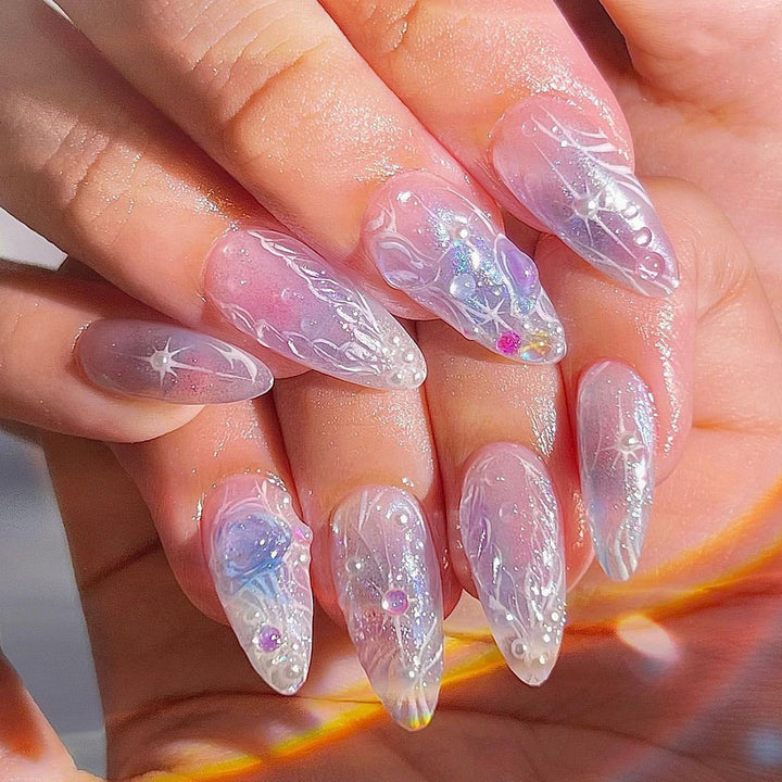 Artful nail extensions in an elegant design with gloss accents Stornfield