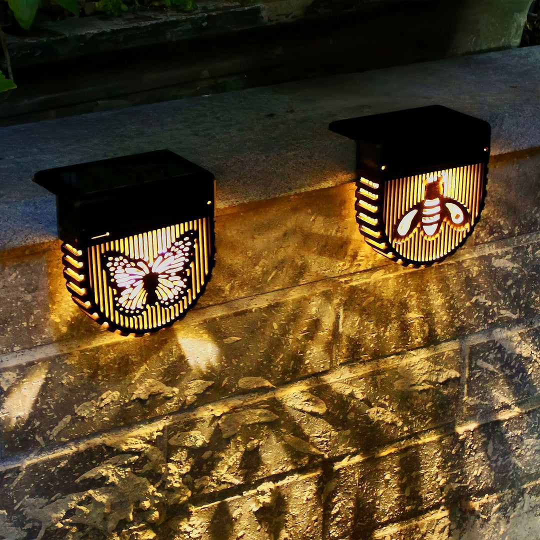 Decorative Solar-Powered Outdoor Wall Lanterns With Laser-Cut Insect And Floral Panels And Warm LED Ambiance Stornfield