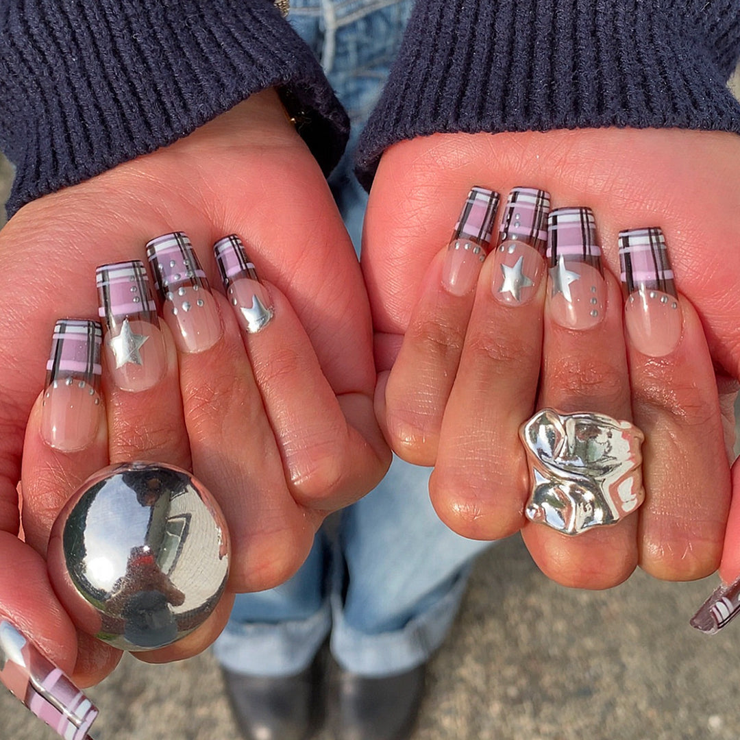 Artificial nails in modern check pattern with glitter and star details Stornfield