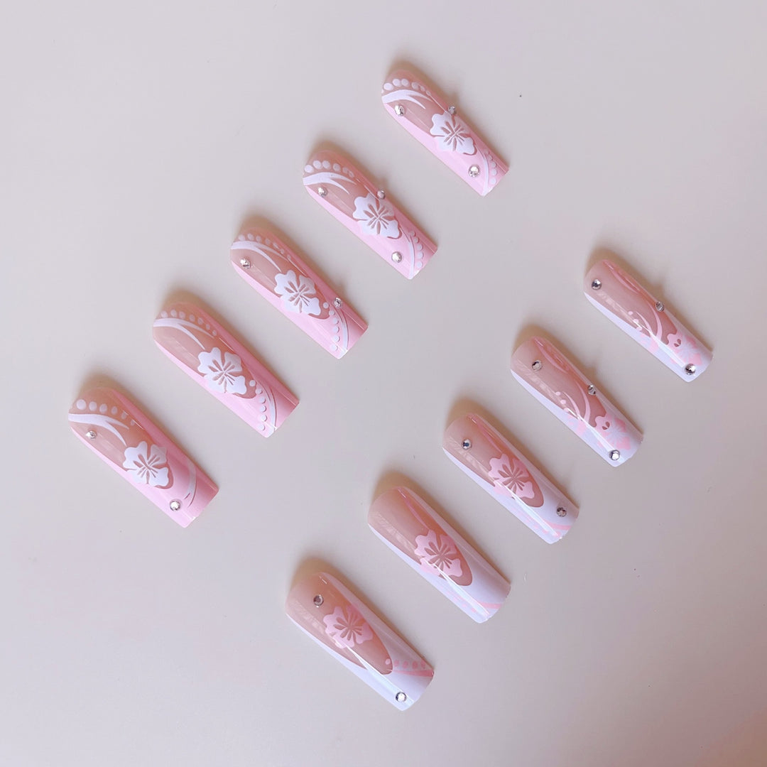 Art nail set with elegant flower design and crystal embellishments Stornfield