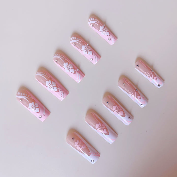 Art nail set with elegant flower design and crystal embellishments Stornfield