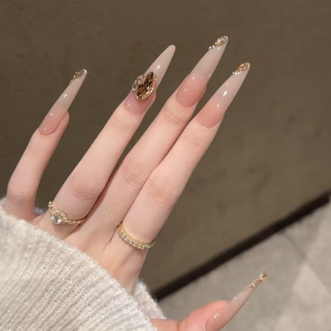 Artistic Stiletto Nail Art Extensions with Gemstone Accents