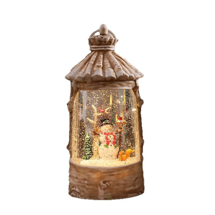Illuminated Christmas lantern with snow scenes Stornfield