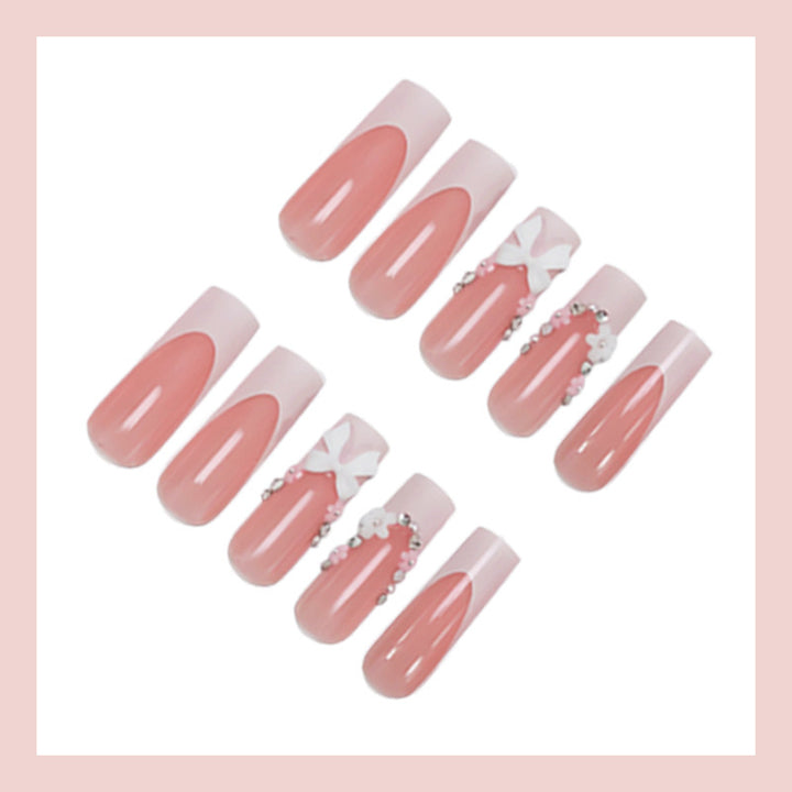 Acrylic Nail Set with Elegant Bows and Glitter Accents Stornfield