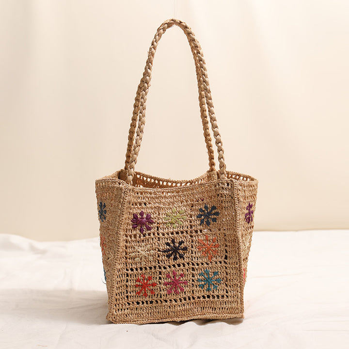 Handcrafted straw bag with colorful embroidery design Stornfield