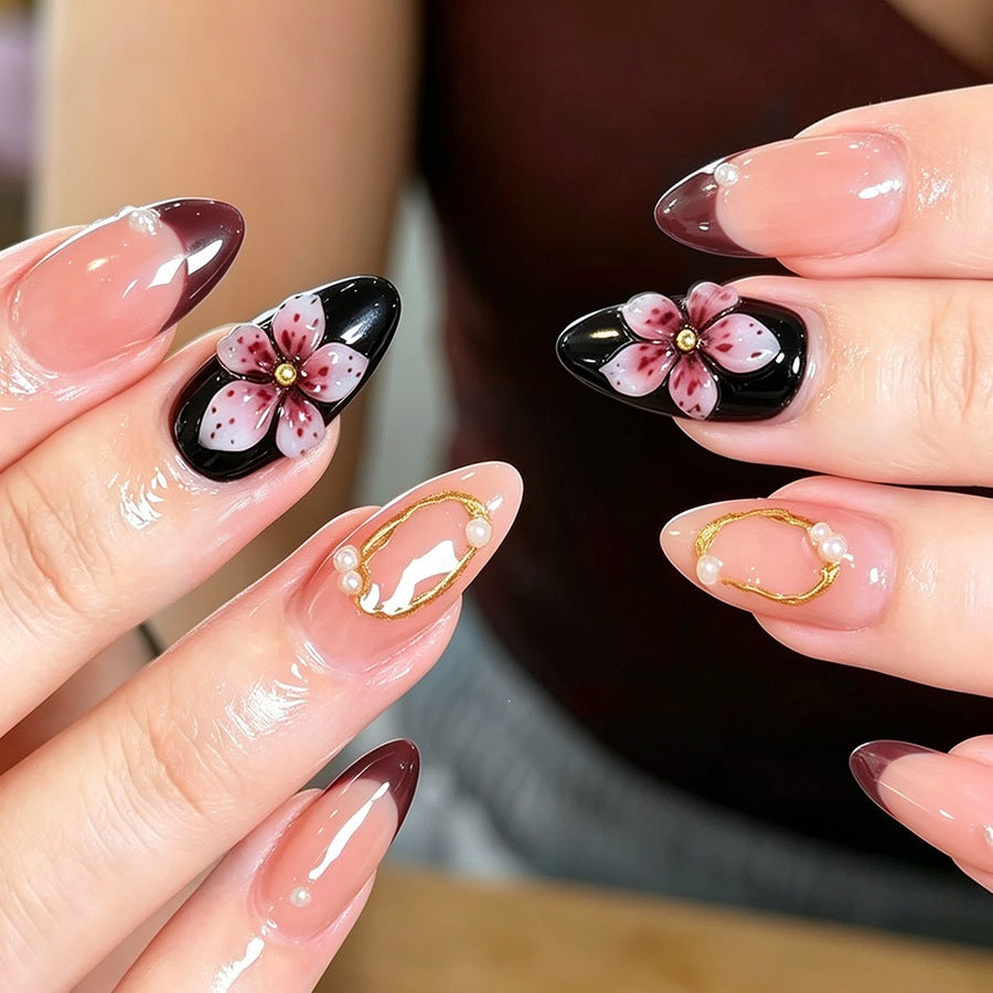 Artificial nail set with elegant flower and glitter details Stornfield