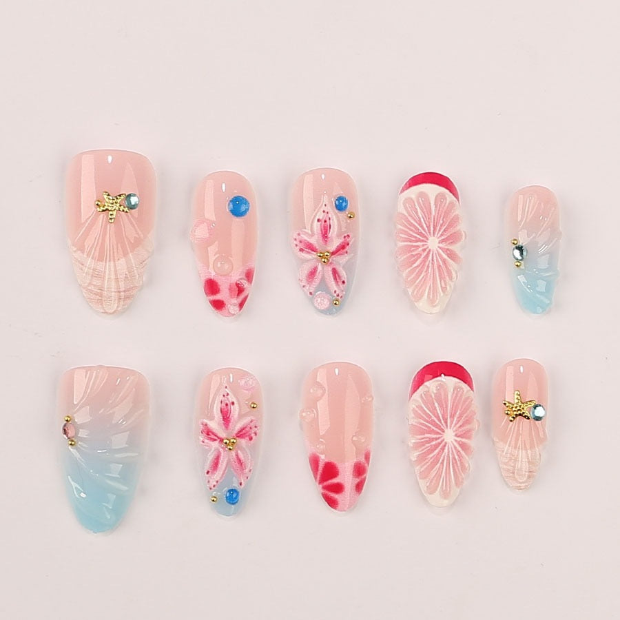 Nail art set with maritime motifs and luxurious glitter accents Stornfield