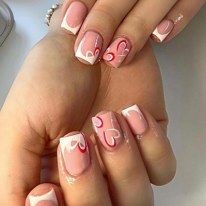 Artificial nail set with intricate floral design and elegant details Stornfield