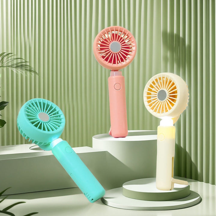 Women portable mini hand fan with integrated LED lighting and USB charging function Stornfield
