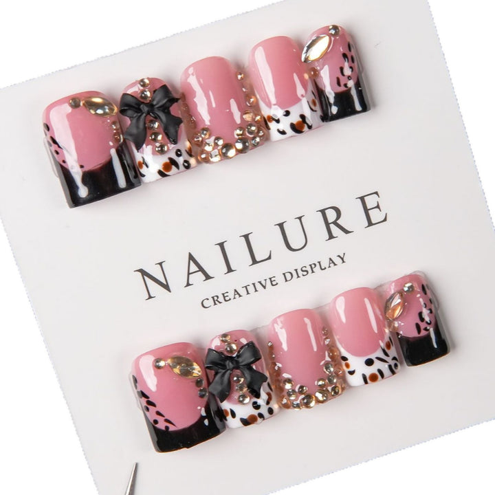 Decorative Press-On Nail Art with Gem Accents