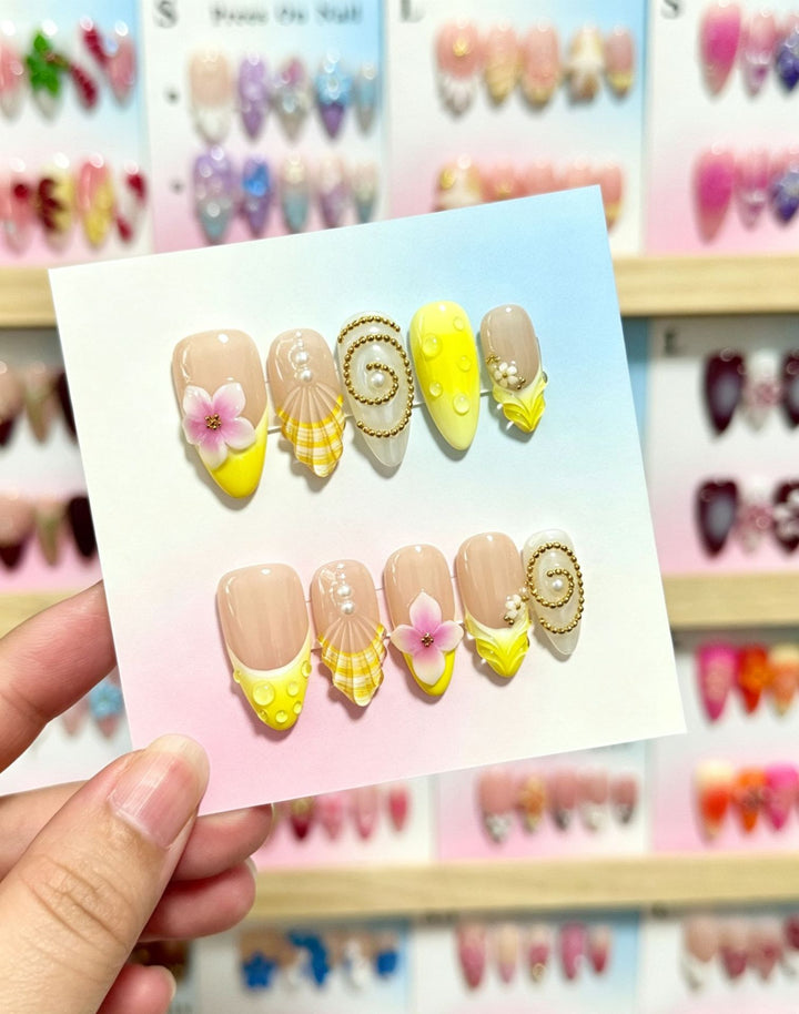 Artistic Press-On Nail Set with Floral and Green Accents