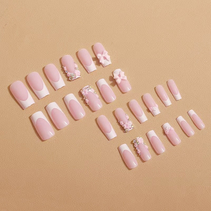 Art nail set with floral 3D accents and glitter decorations Stornfield