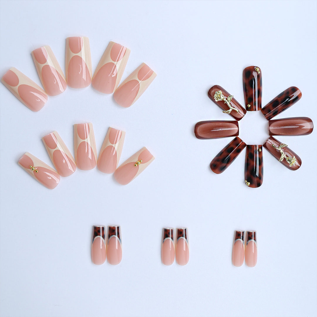 Artificial nails with luxurious embellishments and animalistic design Stornfield