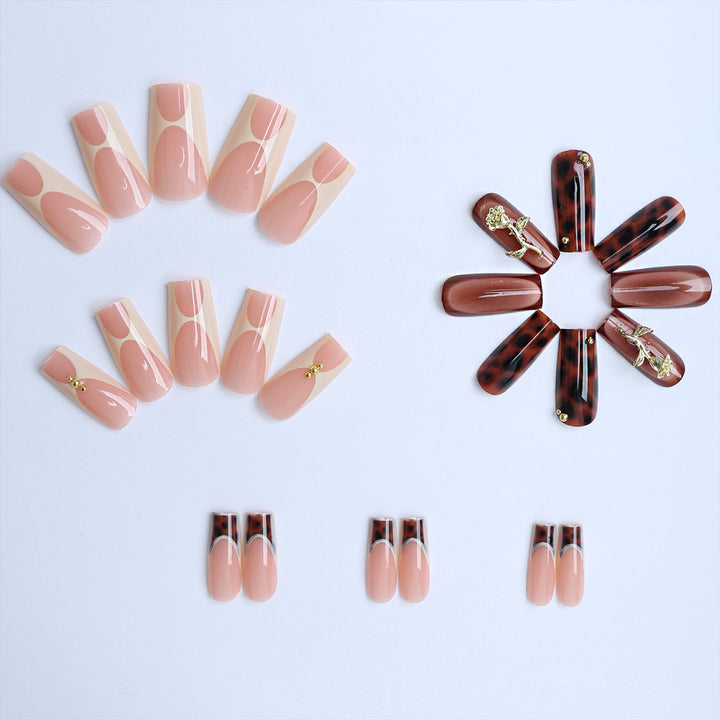 Artificial nails with luxurious embellishments and animalistic design Stornfield