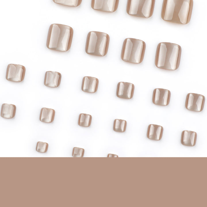 Artful toenail design with glossy accents Stornfield