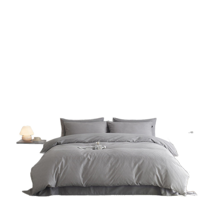 Reversible cotton percale bedding set with fine relief texture and additional pillowcases