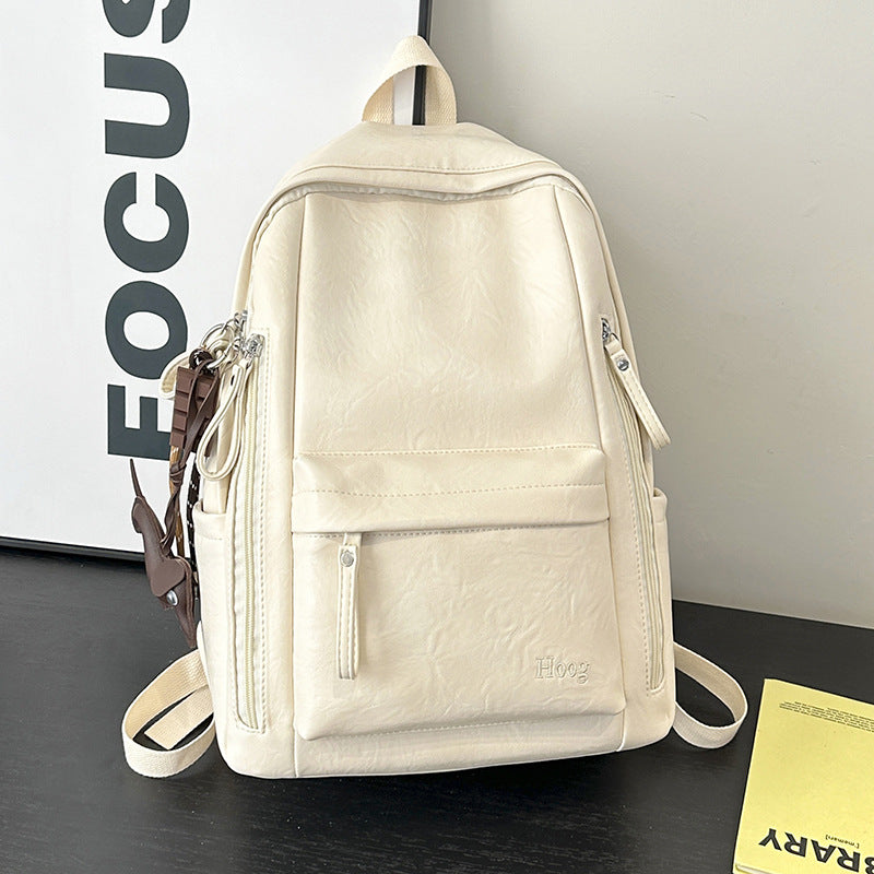 Durable Leather Backpack with Multi-Compartment Design
