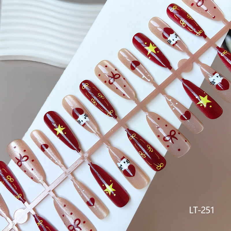 Artificial nails in festive Christmas design Stornfield