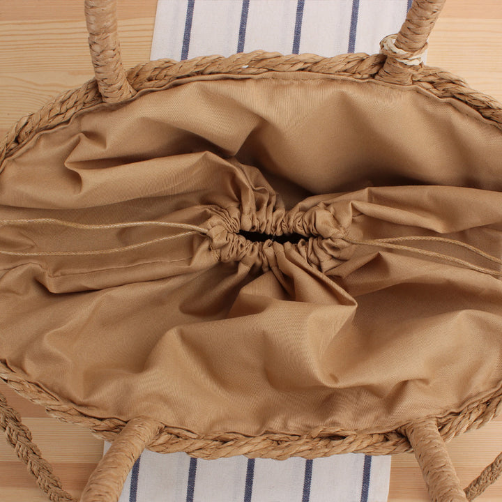 Braided crossbody bag with tassel decoration Stornfield