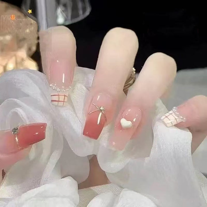 Glamorous artificial nails with rhinestone details Stornfield