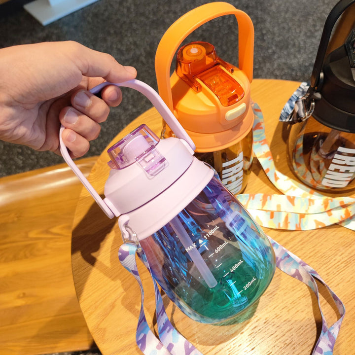Women's multifunctional water bottle with safety closure and ergonomic carrying handle Stornfield