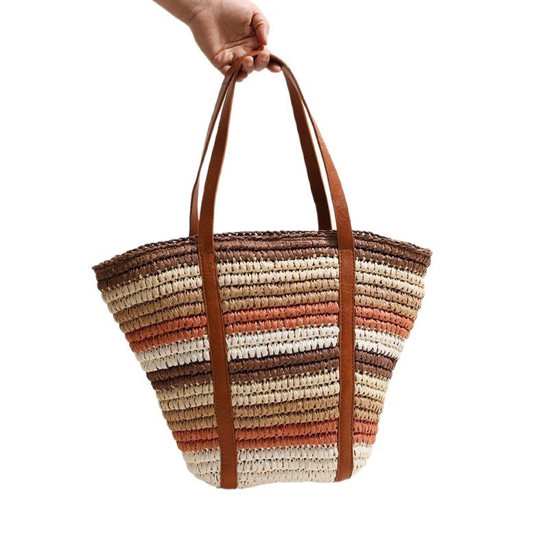 Braided straw tote bag with sturdy leather handles Stornfield
