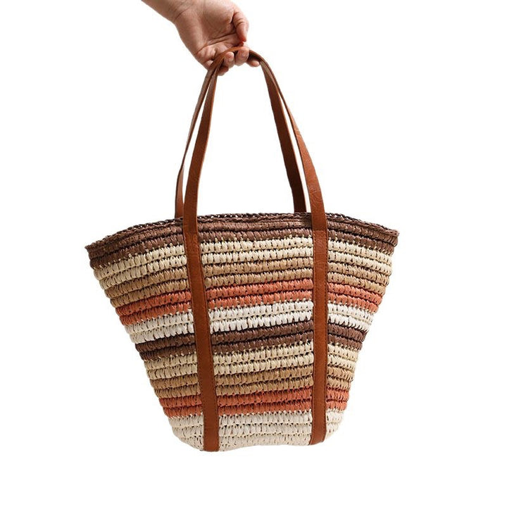 Braided straw tote bag with sturdy leather handles Stornfield
