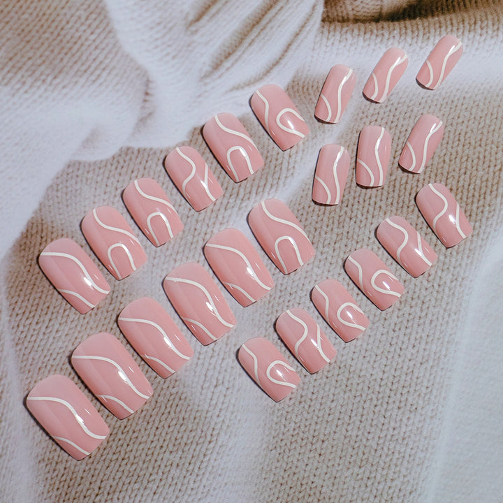 Elegant Press-On Nail Design with Artistic White Swirl Stornfield