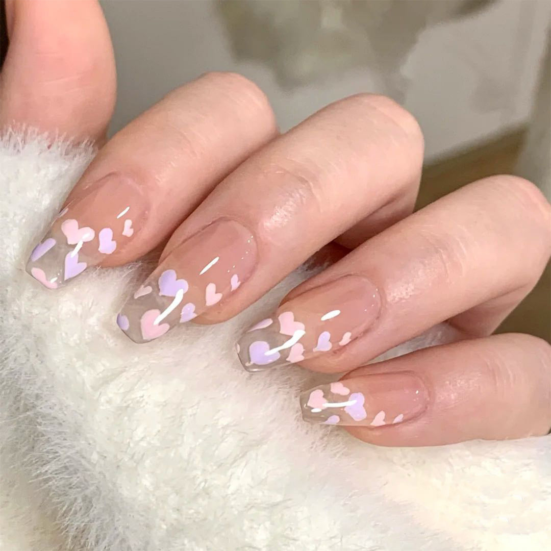 Artful Nail Art with Heart Pattern Stornfield