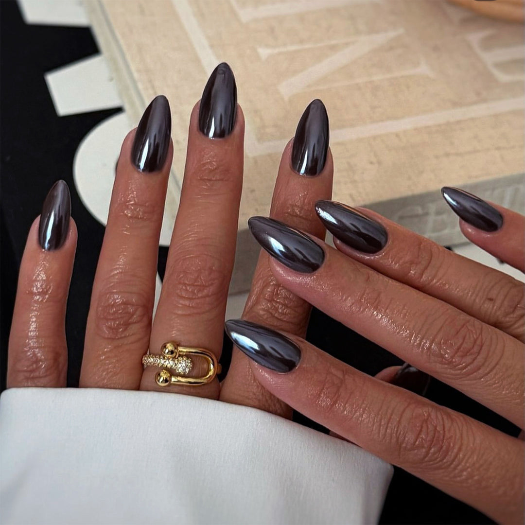 Elegant stiletto nails with reflective finish Stornfield